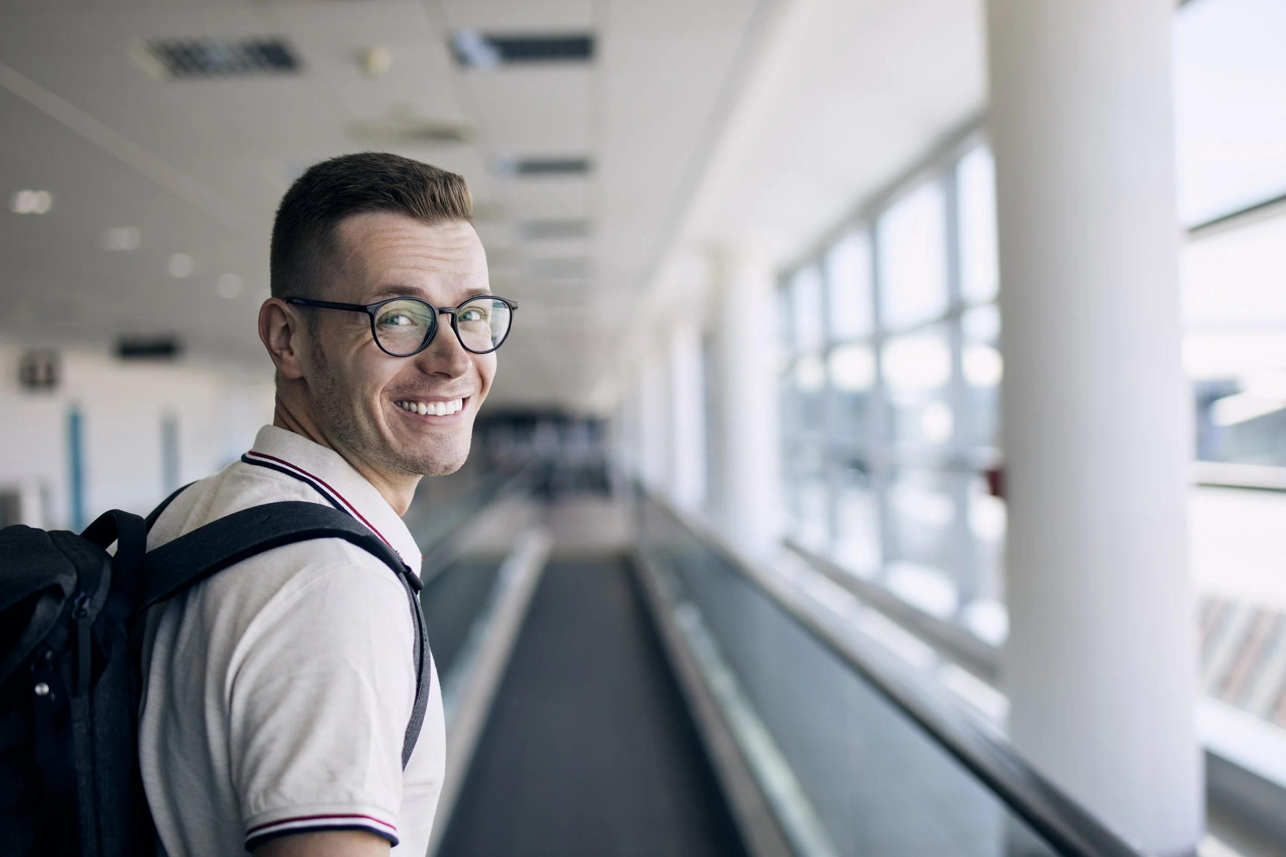 portrait-of-smiling-traveler-at-airport-2026-01-08-01-32-23-utc.jpg
