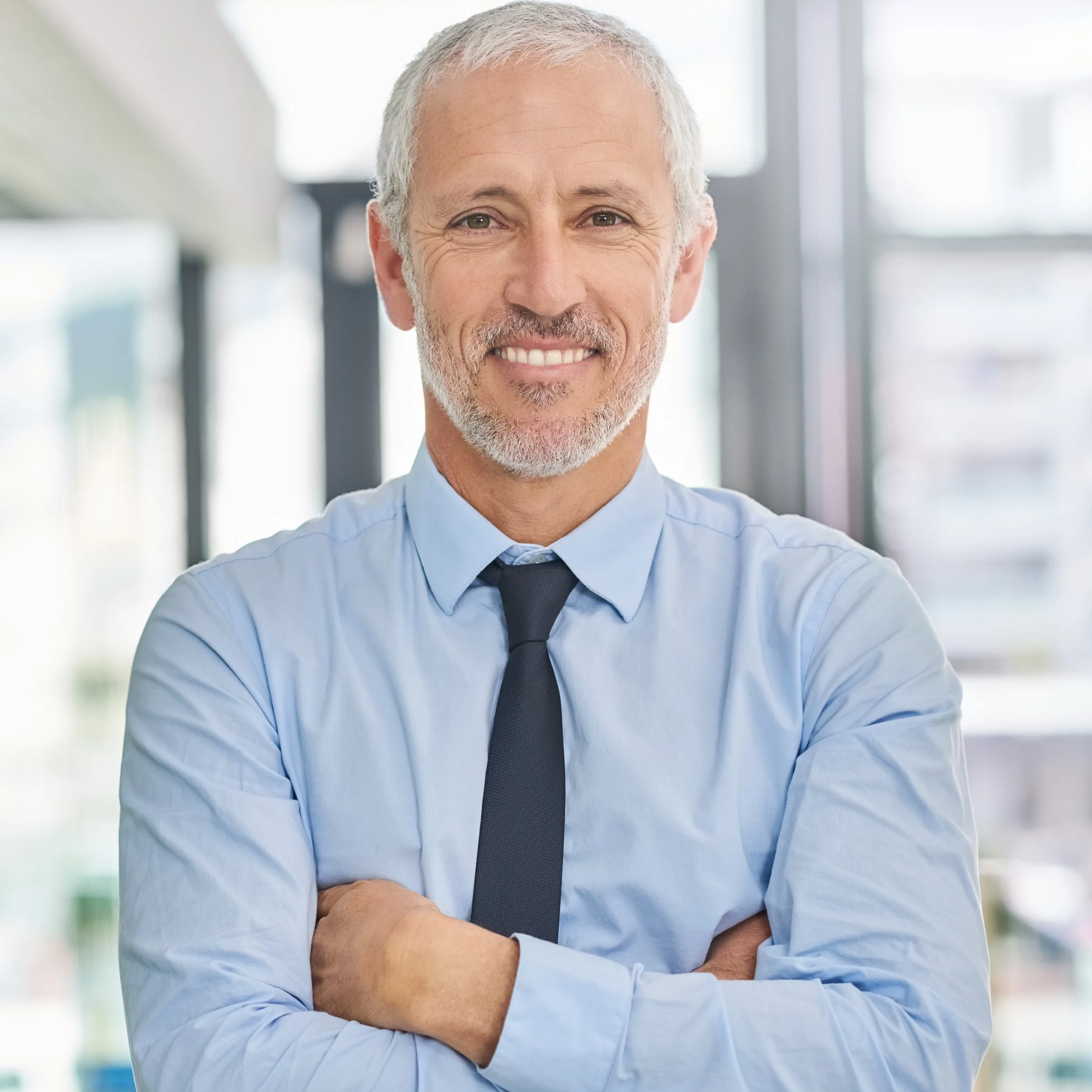 confident-professional-man-smiling-in-modern-workp-2026-03-25-03-31-07-utc.jpg