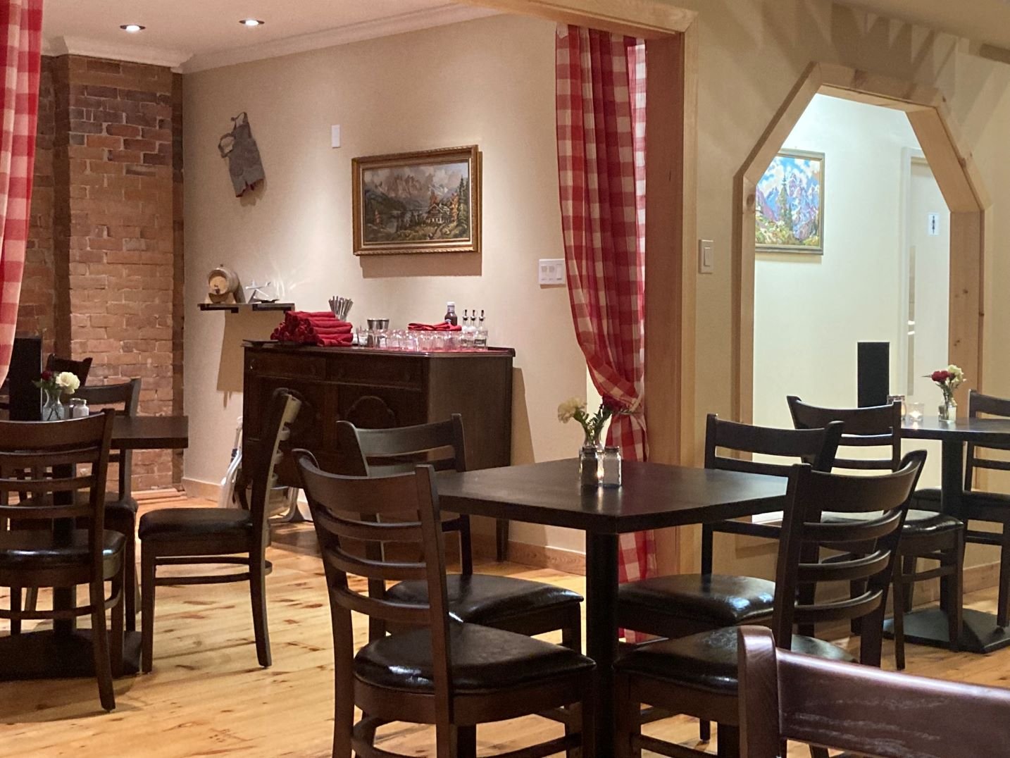 Gigham curtains separate dining areas