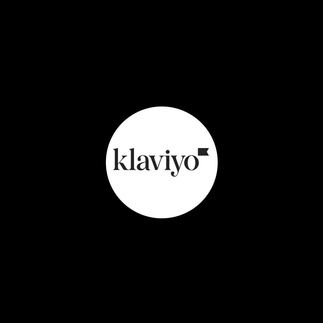 Black background with a white circle in the center containing the word 'klaviyo' in black text.