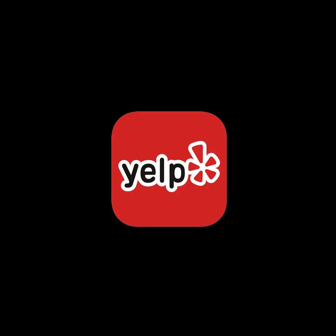 Yelp app icon with red background, black text, and a white flower logo.
