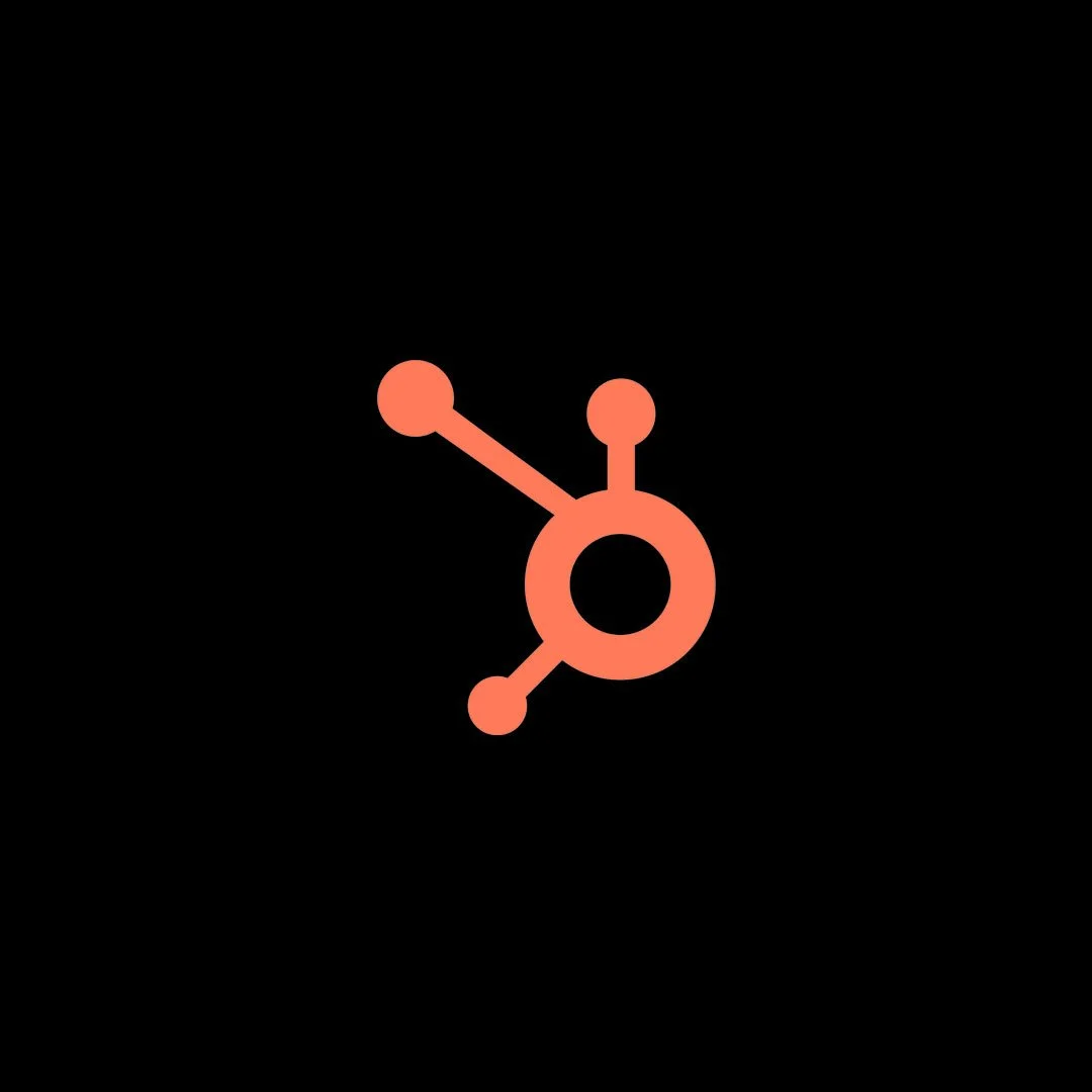 Dark background with a red, stylized molecule icon in the center.