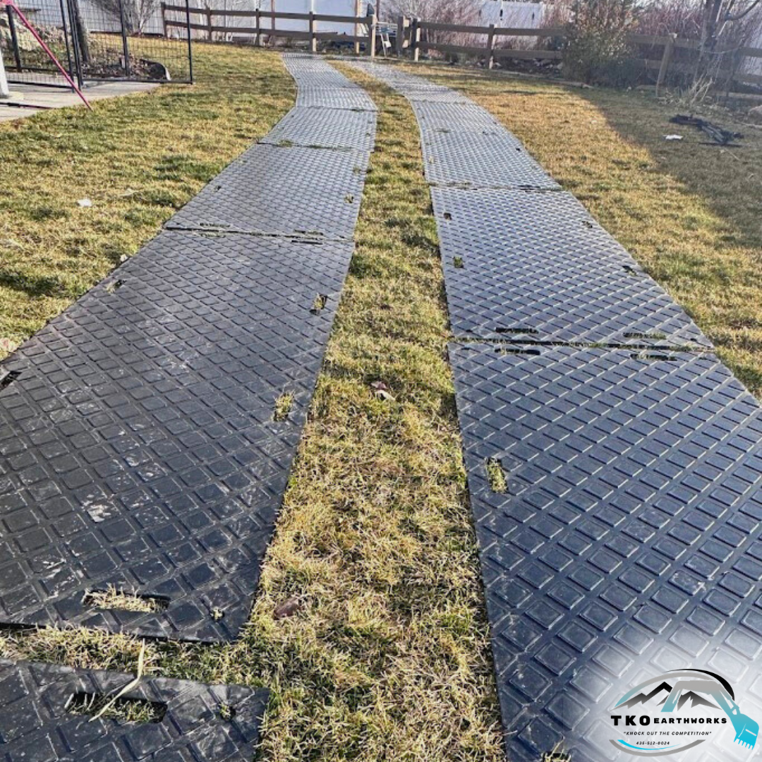 Ground Protection mats to keep the machines tracks off the grass