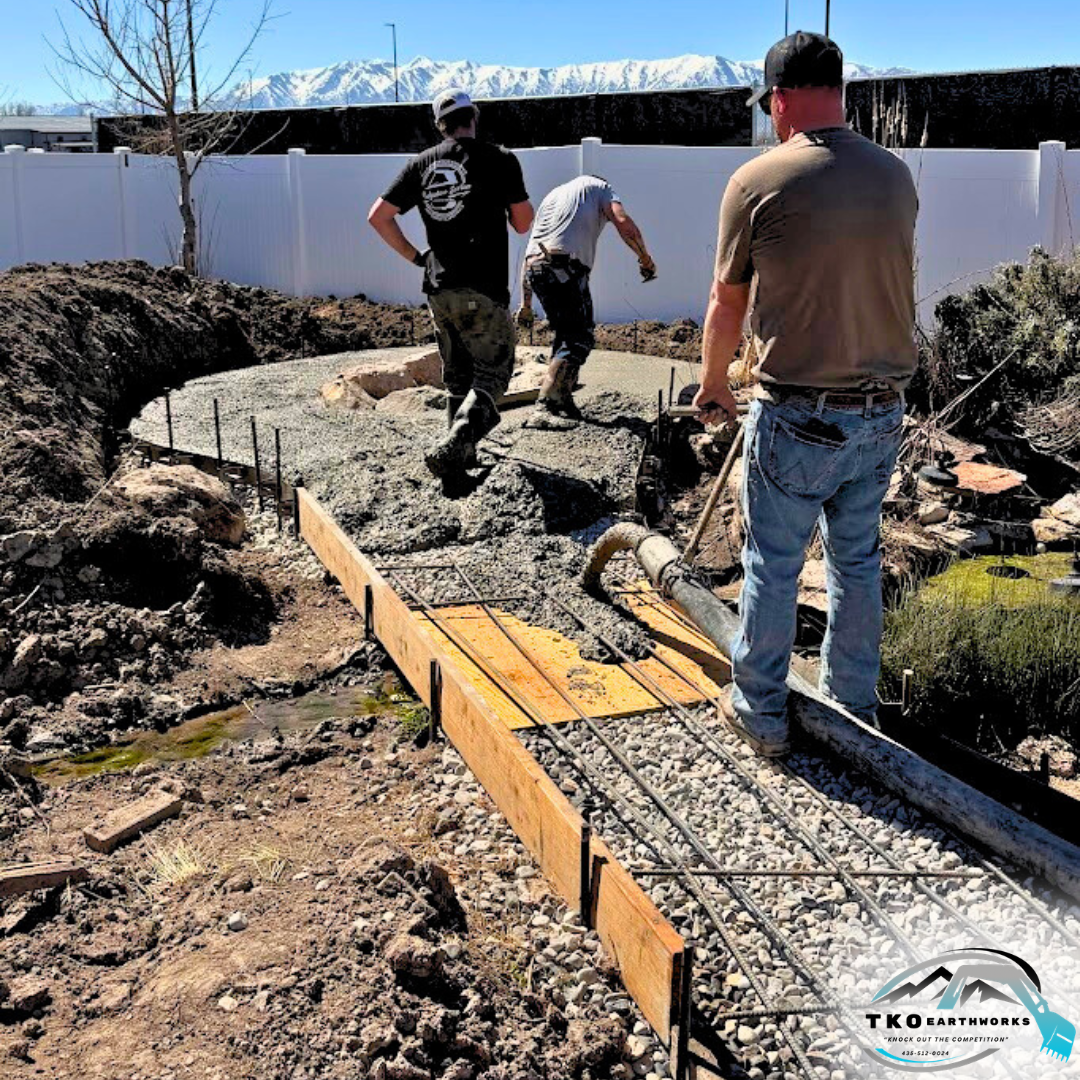 Pouring concrete for a custom pathway to a Fire Pit