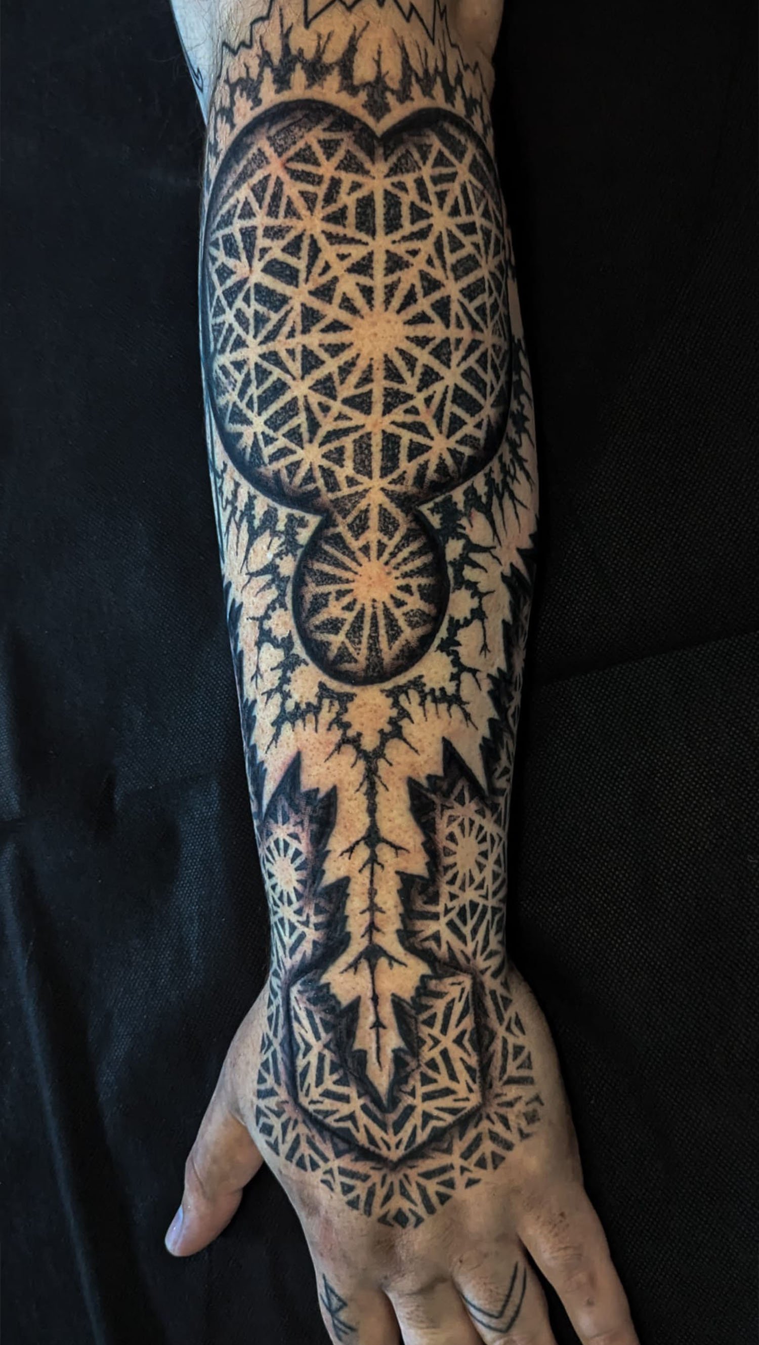 Fractal dotwork forearm and hand tattoo