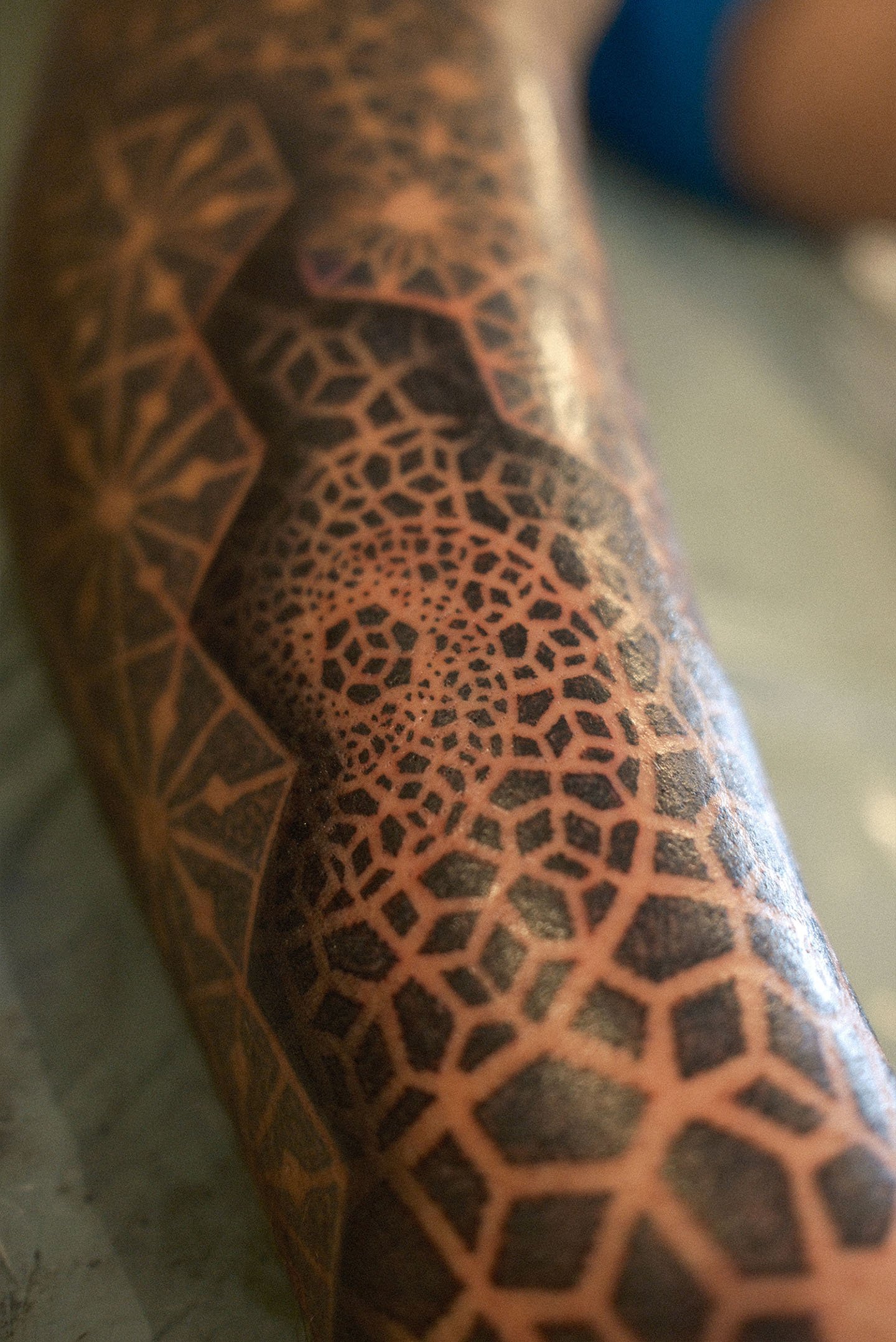 Geometric dotwork pattern tattoo