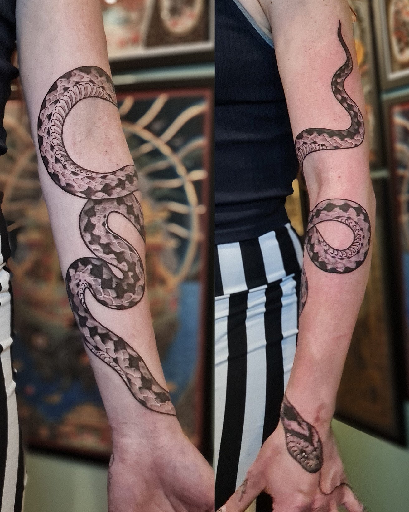 Person with a detailed snake tattoo wrapping around their arm.