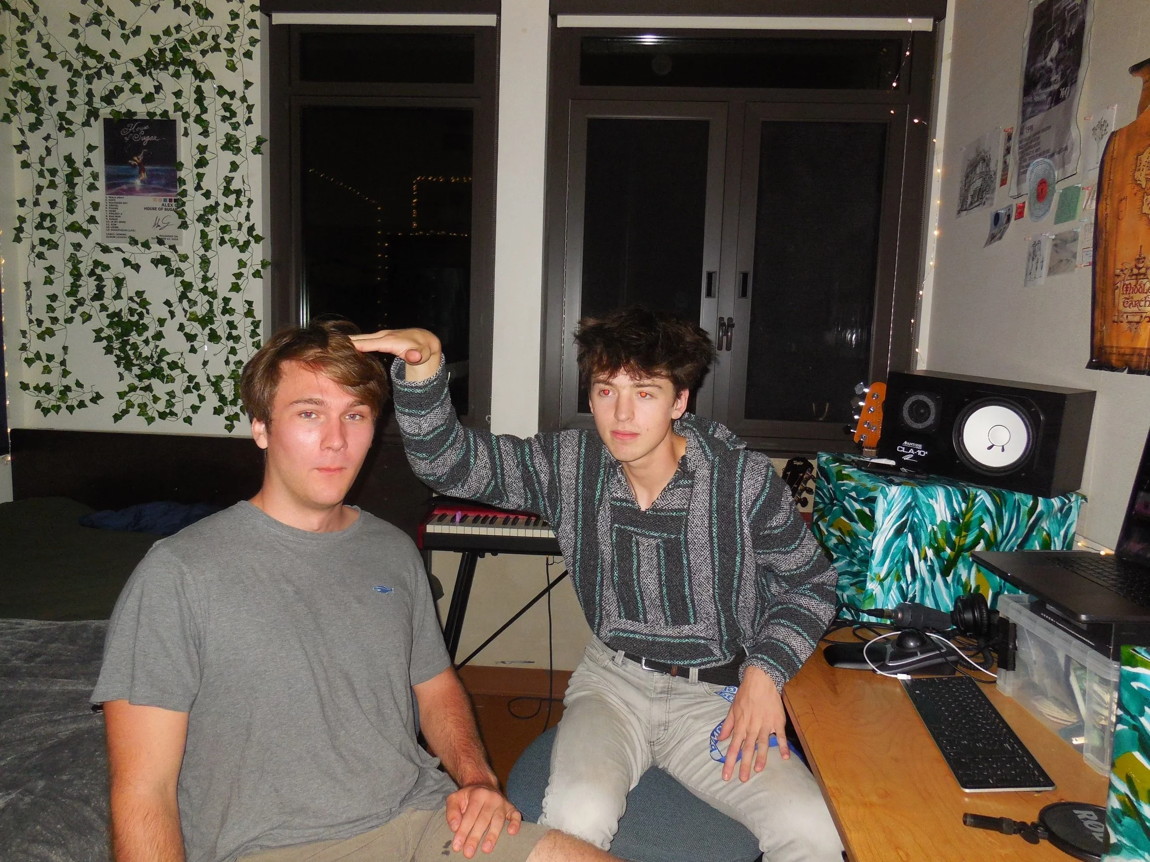 Denson Camp, musician, in his college studio with his friend, George