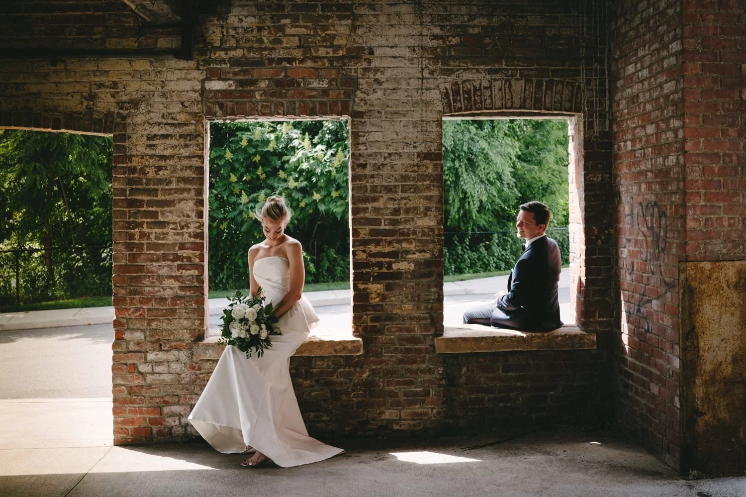 Couple posing before their wedding at the Roundhouse Beacon