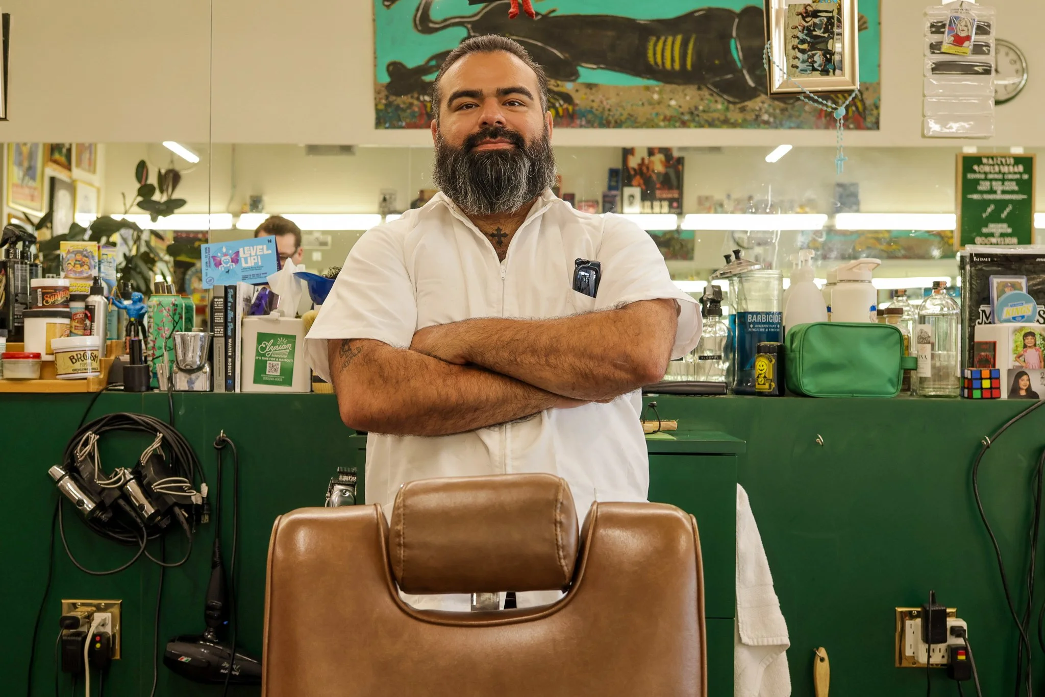 Joseph, Barber at Elysian Barbershop. Photographed in the barbershop in East Hollywood.