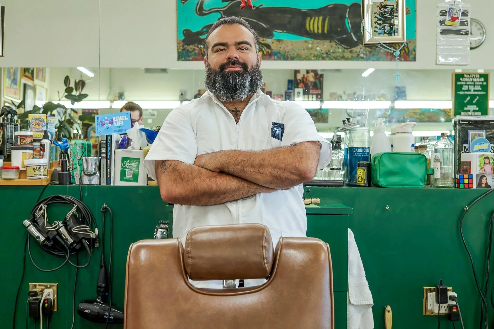 Joseph, Barber at Elysian Barbershop. Photographed in the barbershop in East Hollywood.
