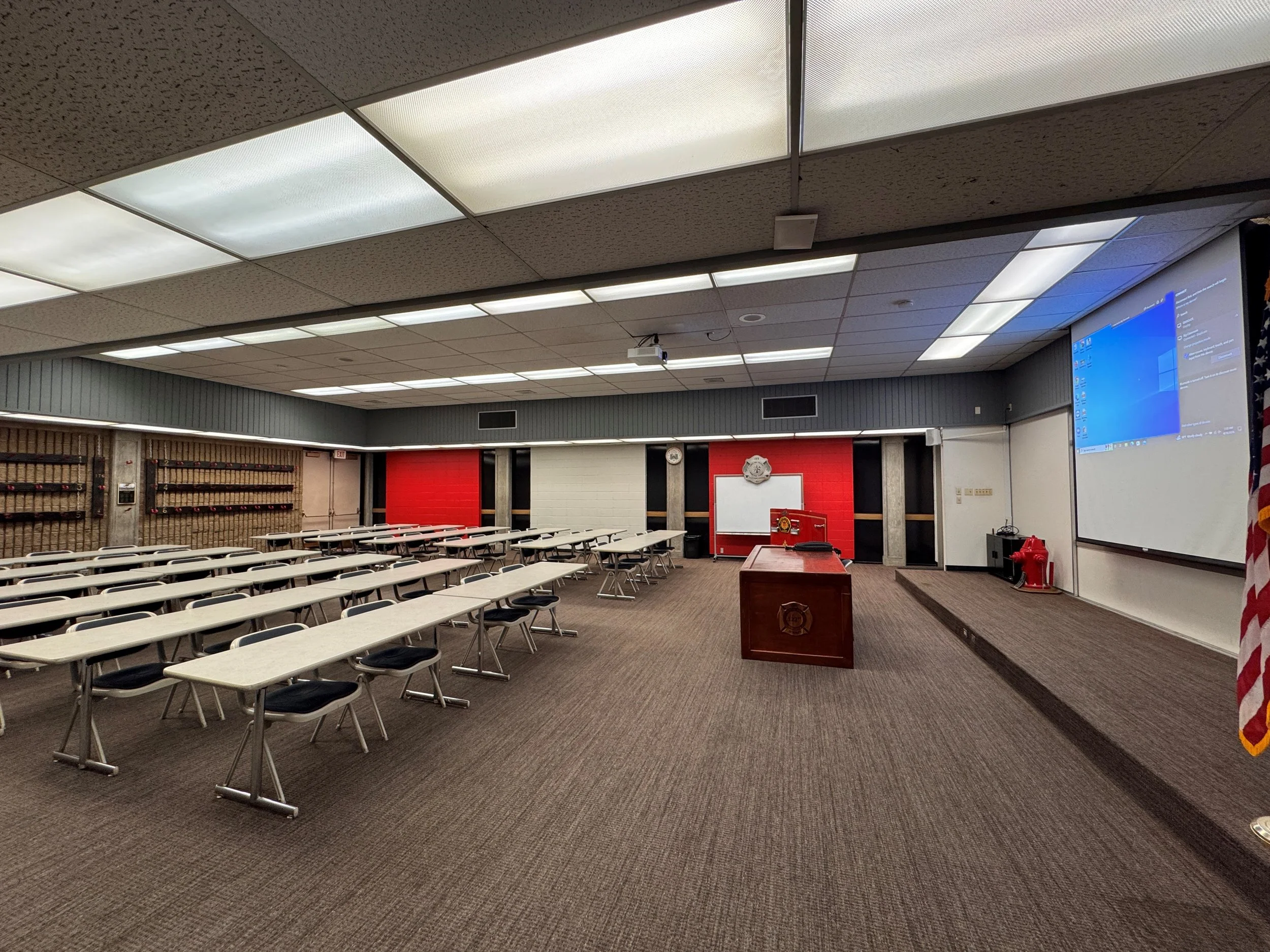 Classroom with tables and chairs that fits 48-100 people 