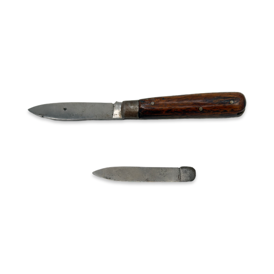 Vintage Magic Trick Knife Through Coat. Mid-20th century.