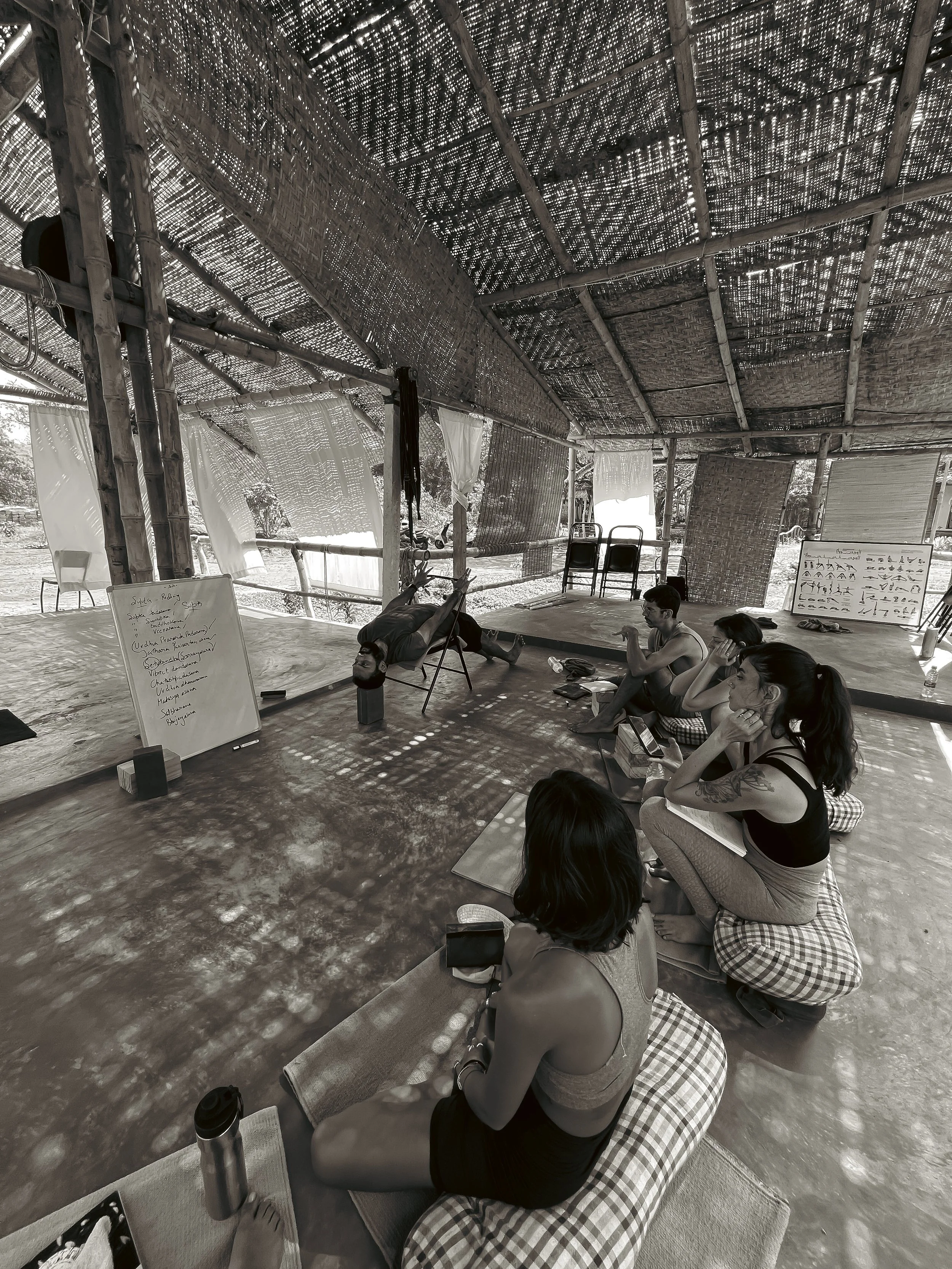 Small group yoga class with individual attention and precise alignment cues in Palolem, Goa
