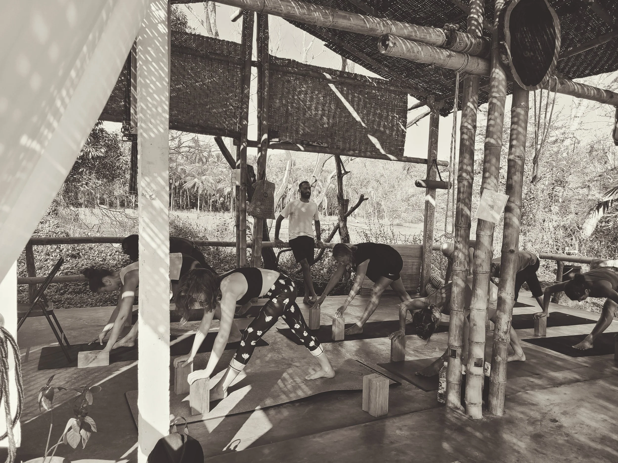 Akshey teaching precise alignment using Iyengar method at Yoga Mandir Goa