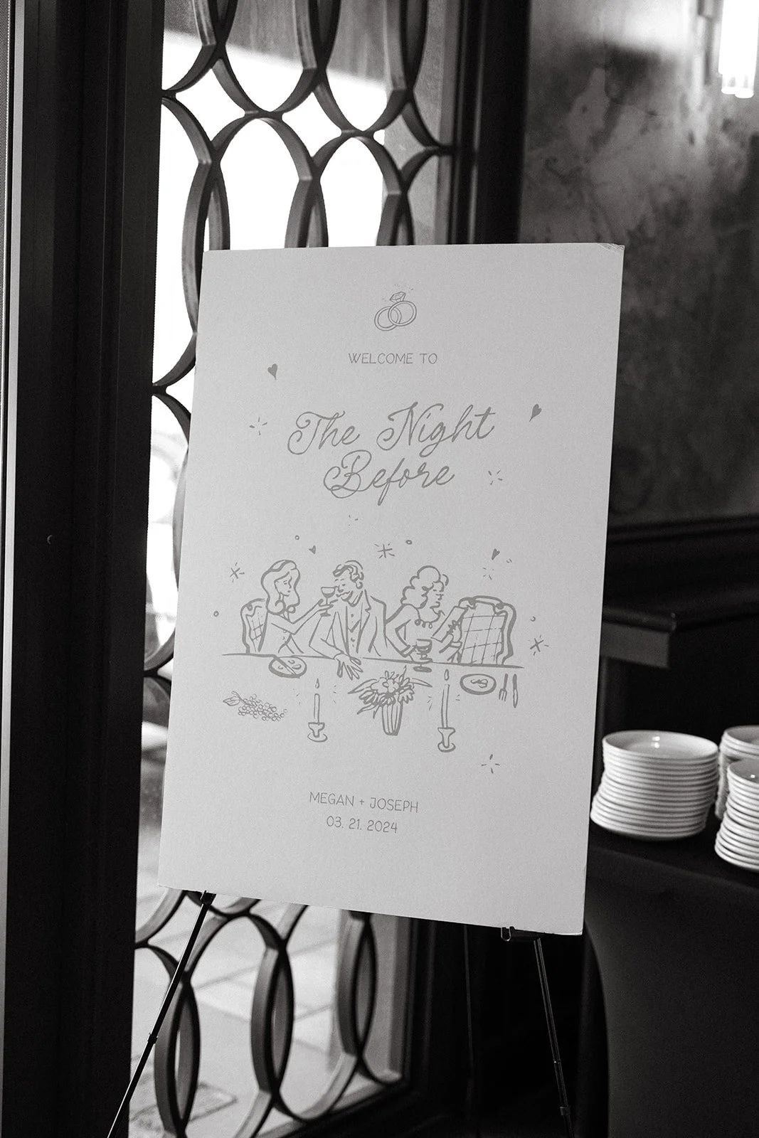 Event sign with wedding illustration and text for Megan and Joseph, dated 03.21.2024.