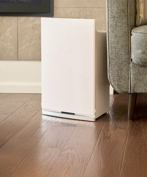 white air purifier in living room