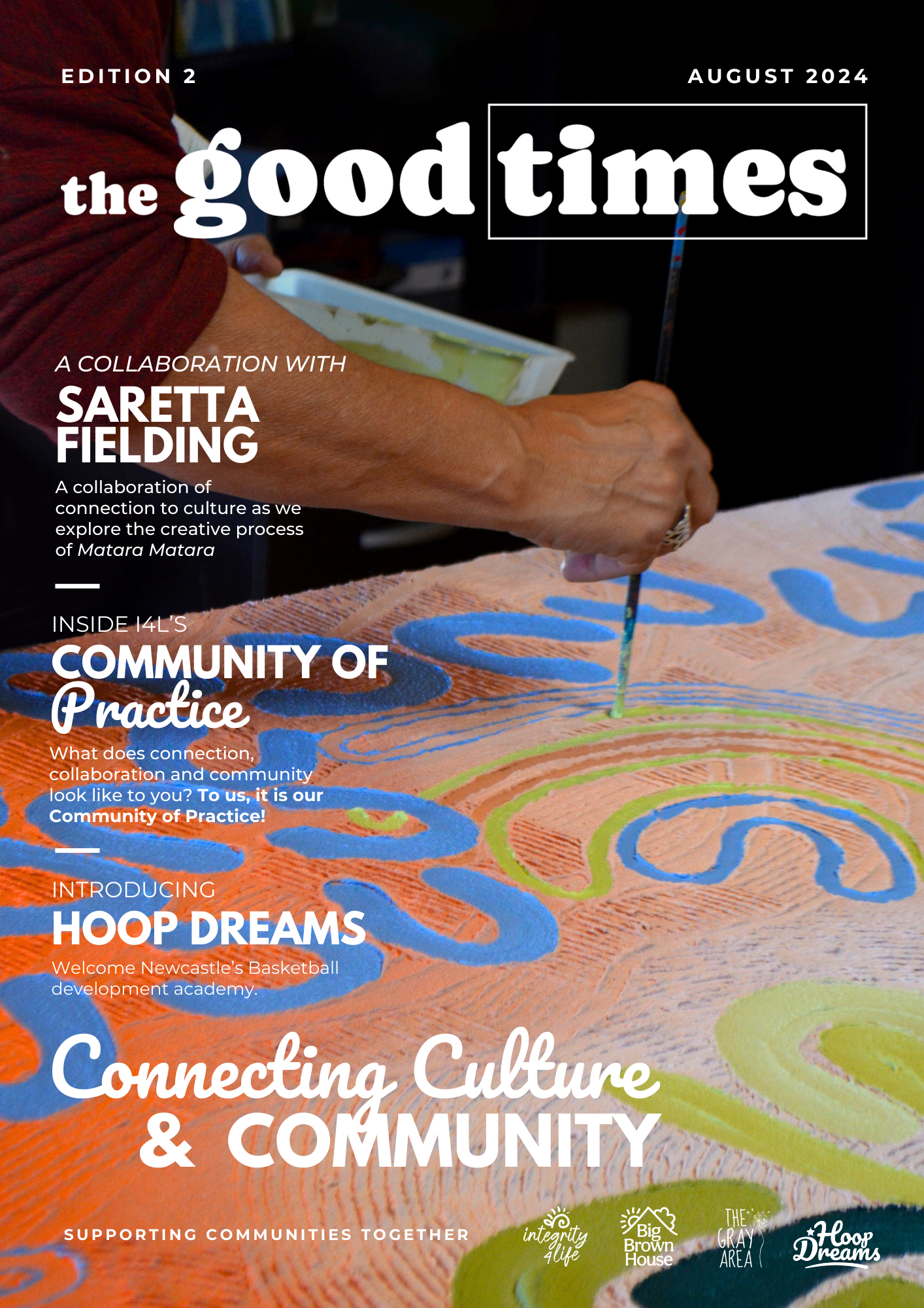 Close-up of a person painting colorful patterns on a fabric, with text overlay advertising a magazine titled 'the good times', Edition 2, August 2024, featuring collaboration with Saretta Fielding and community practice themes.