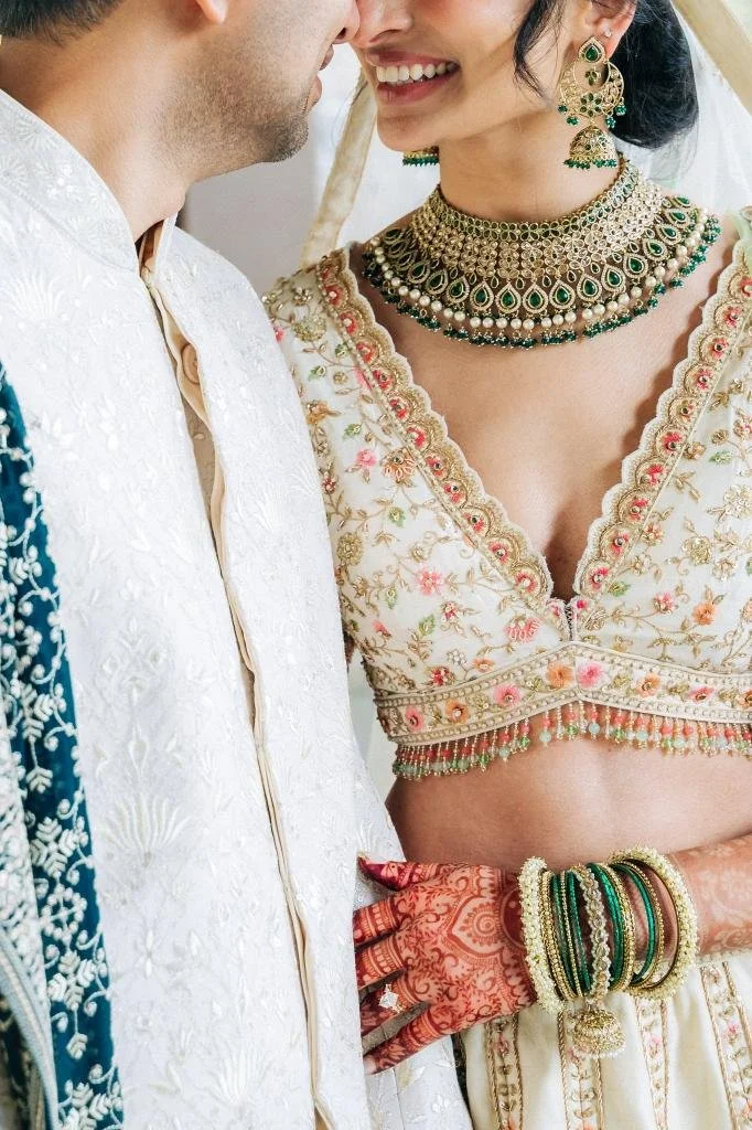 Close-up of the bride and groom embracing during wedding portraits