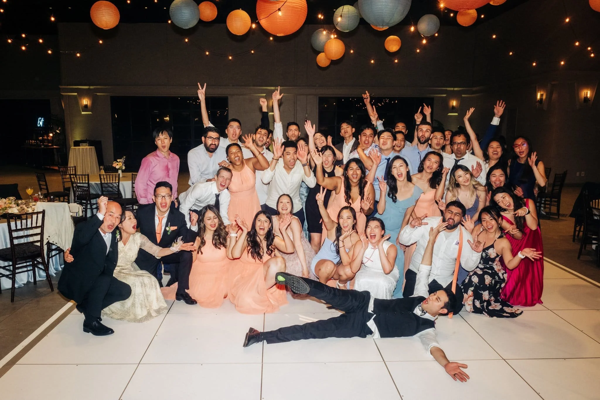 guests dancing on dance floor lively wedding reception palm event center pleasanton ca