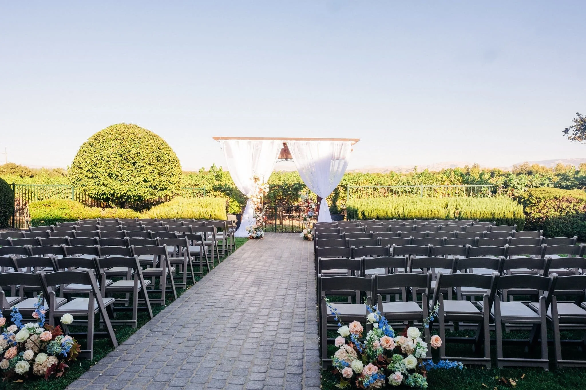 wedding ceremony setup with empty seats and arch palm event center pleasanton ca