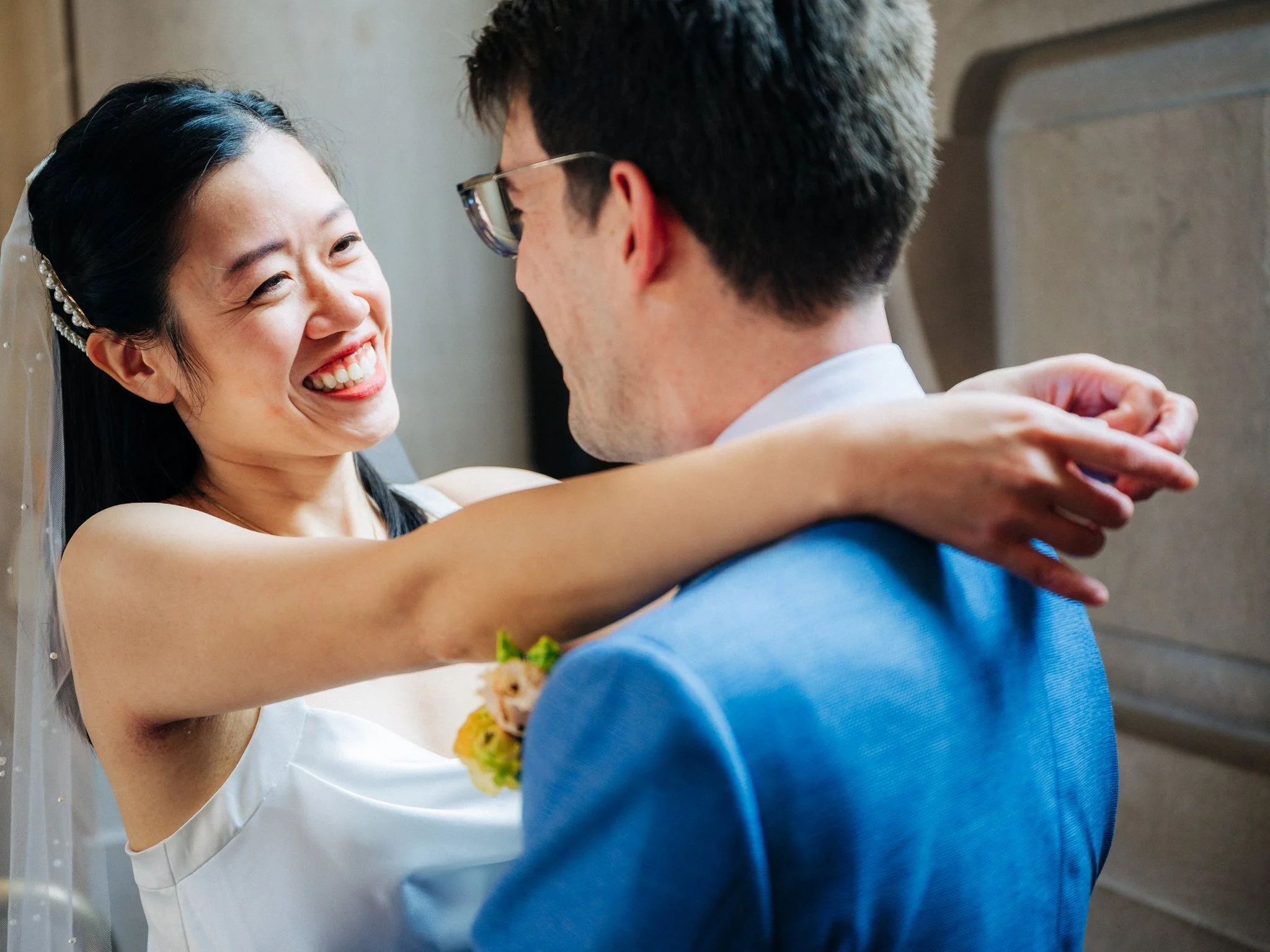 Bride and groom embracing during San Francisco City Hall wedding