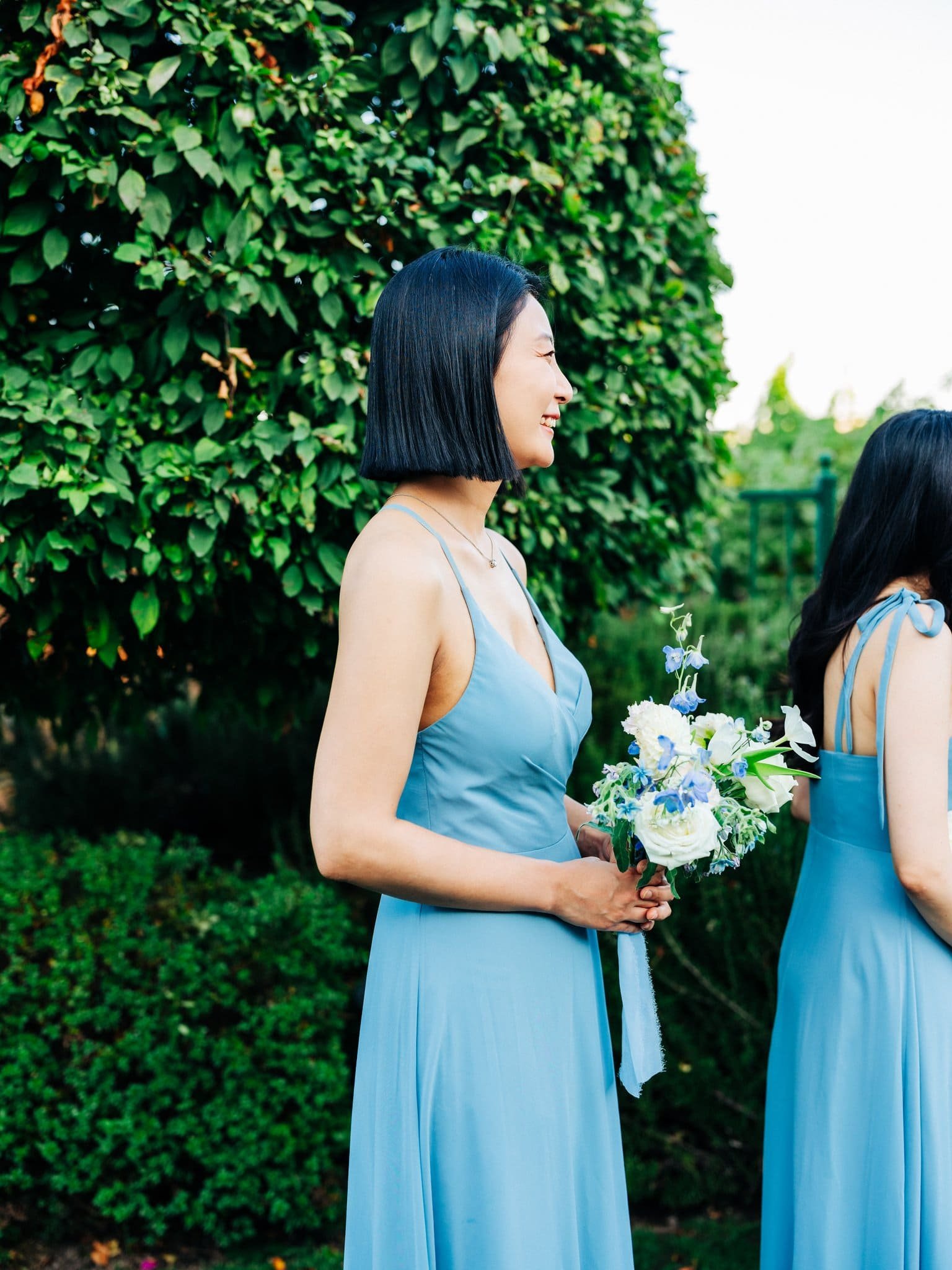 bridesmaid smiling watching ceremony palm event center pleasanton wedding