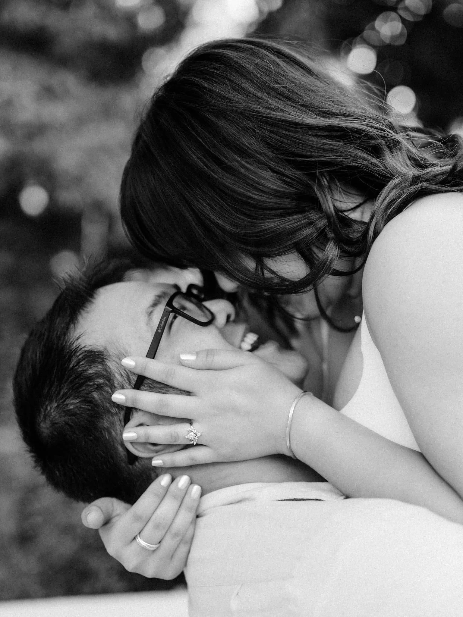 Close-up of the couple smiling face to face during their Montalvo Arts Center engagement photos in Saratoga.