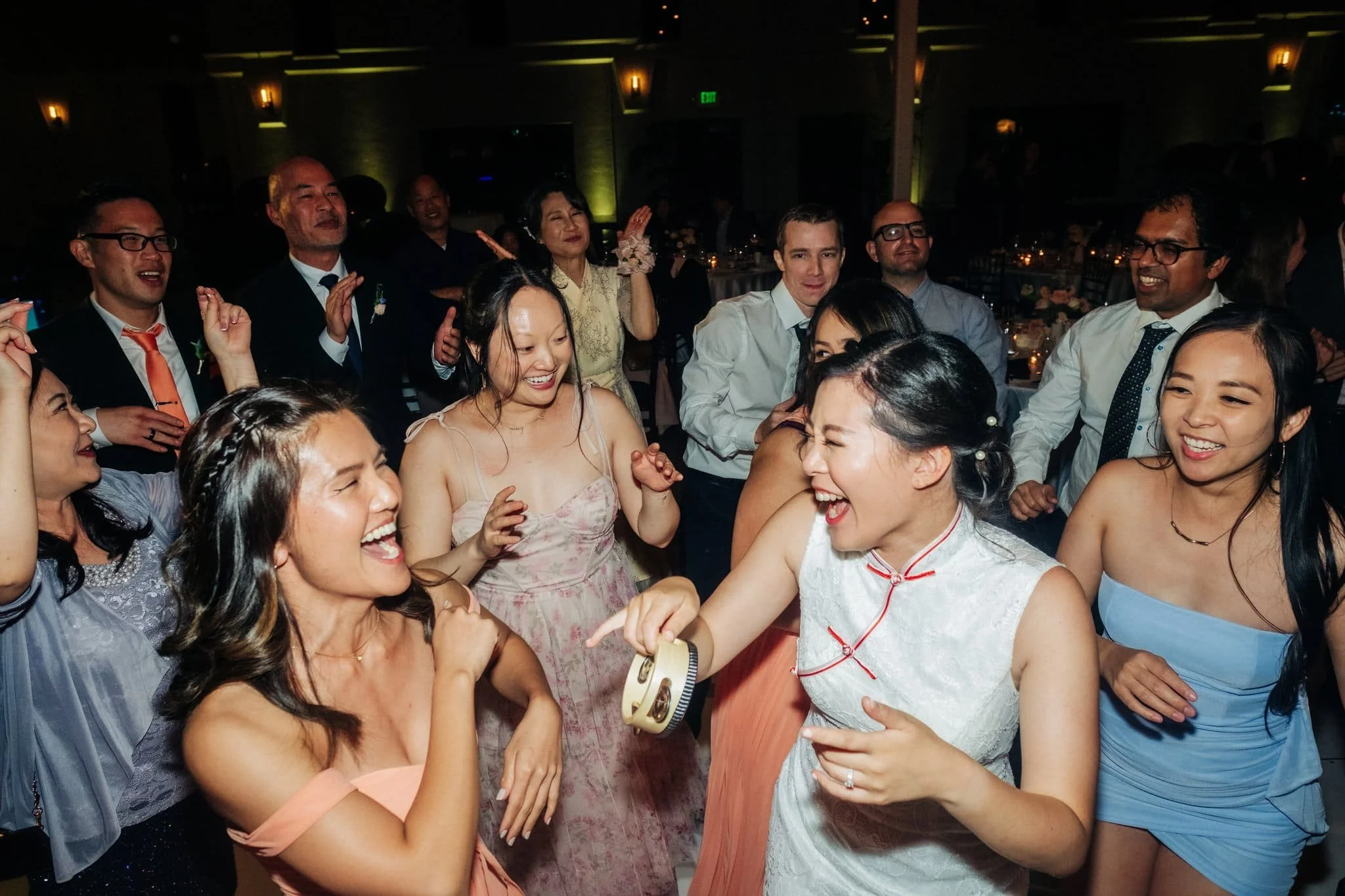 bride dancing with guests on dance floor palm event center pleasanton wedding reception