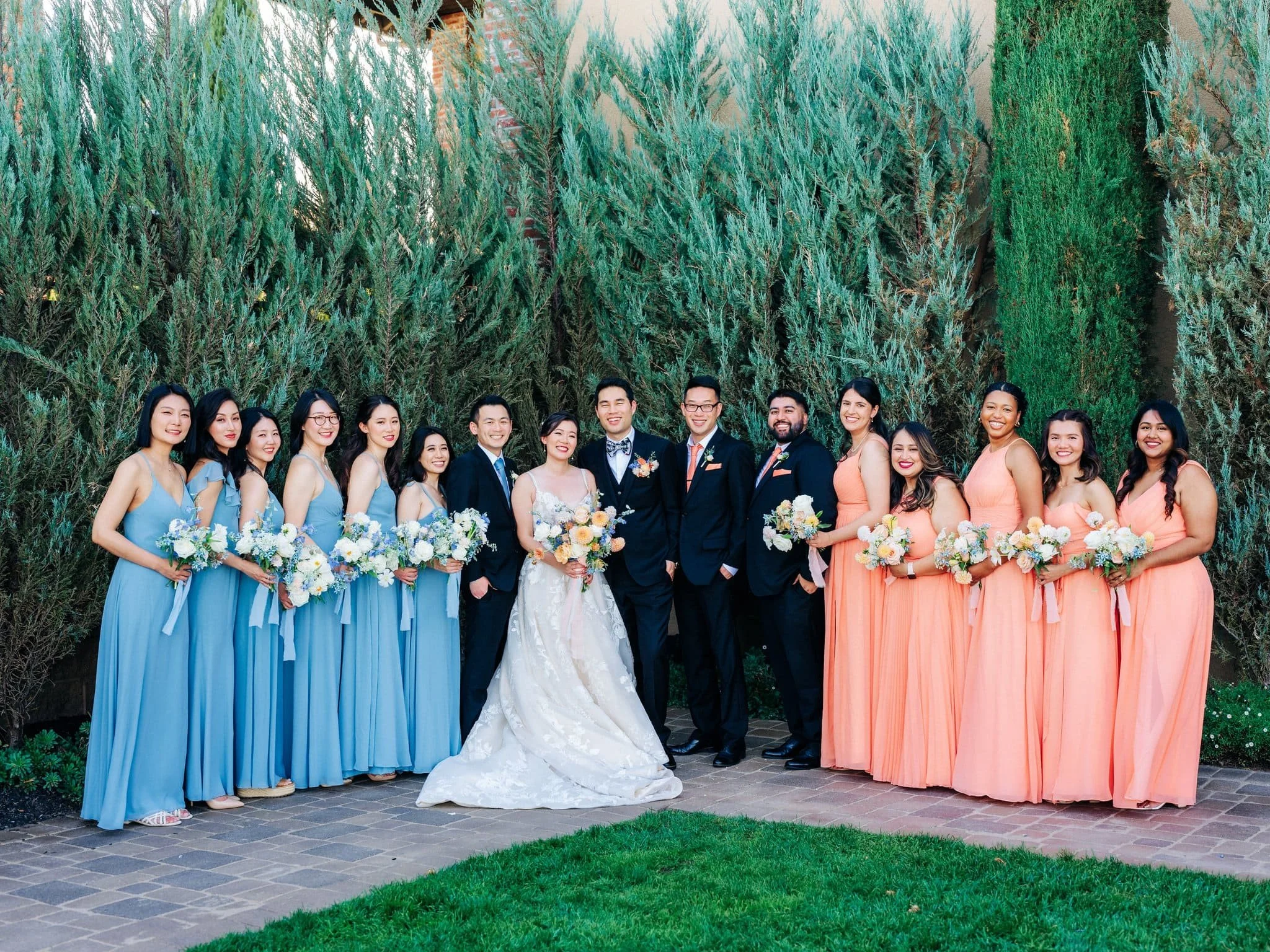 full wedding party with bride groom bridesmaids and groomsmen palm event center pleasanton wedding