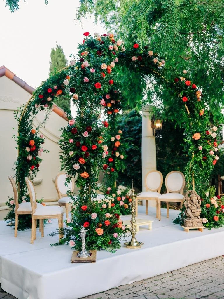 Floral arrangement decorating the altar for the Indian wedding ceremony