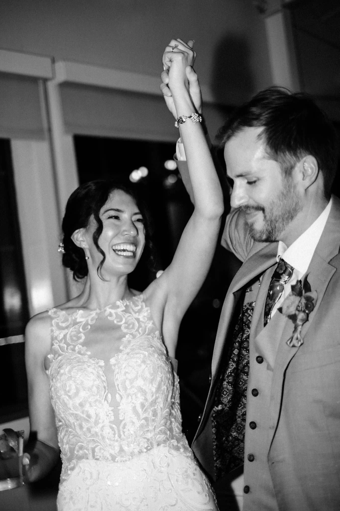 Bride and groom dancing together during reception at Maverick’s Beach House wedding in Half Moon Bay