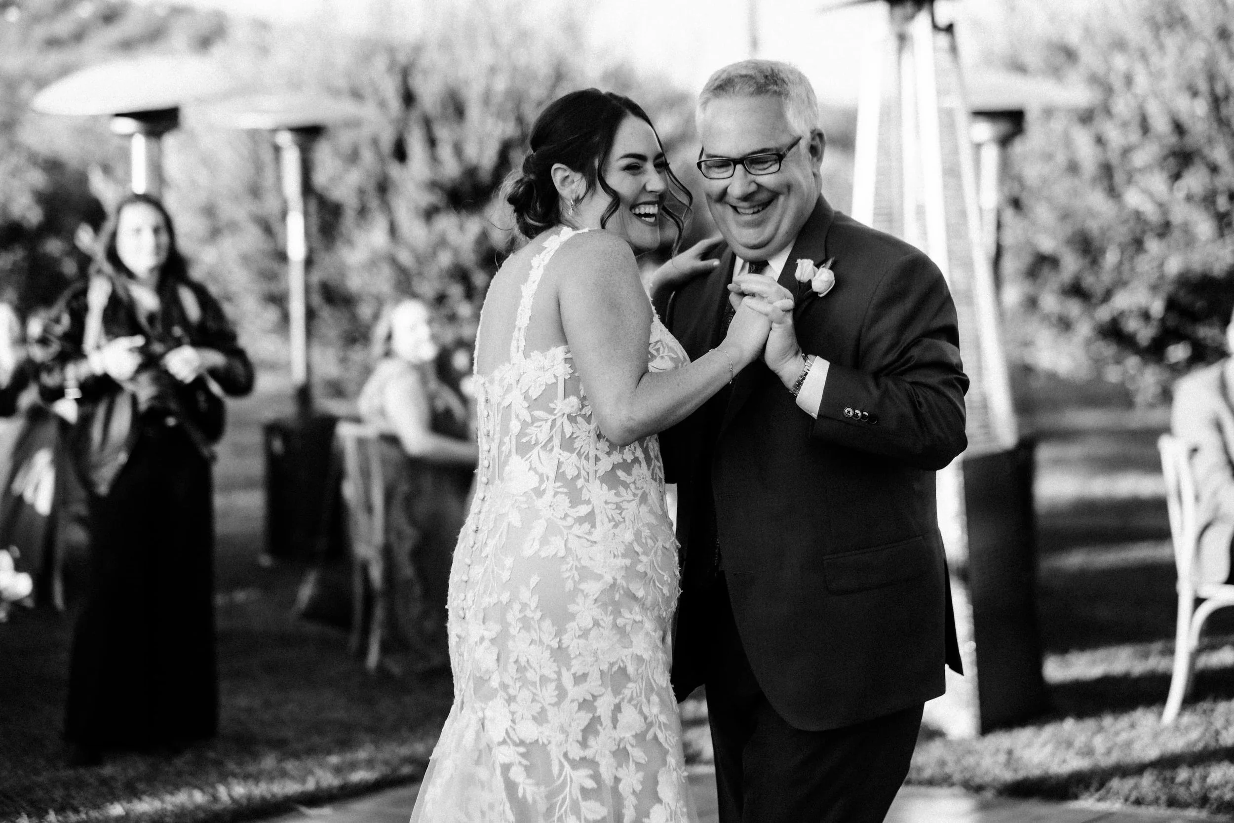 Father and daughter sharing first dance at Purple Orchid Wine Country Resort and Spa wedding reception