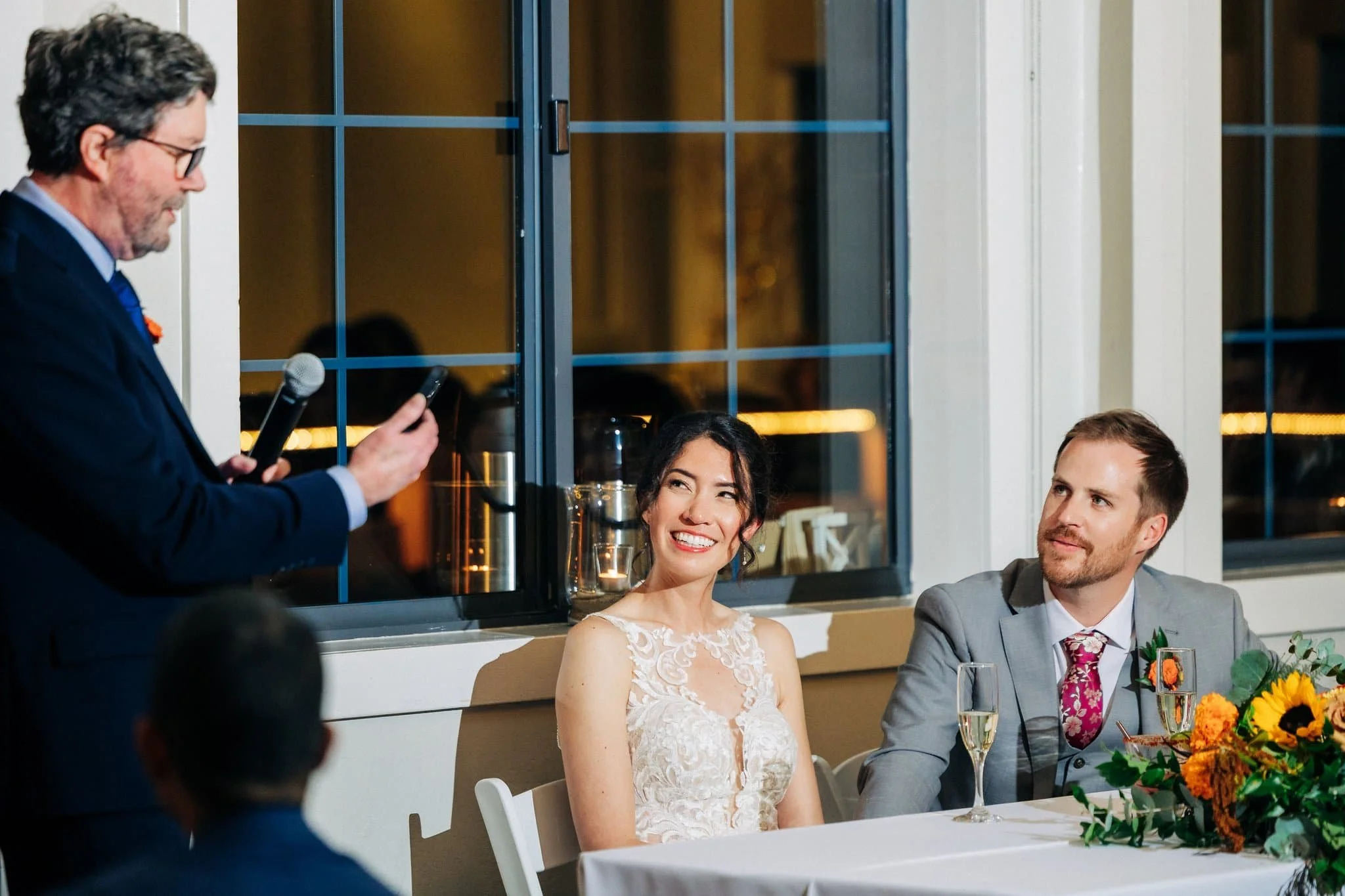 Father of the bride giving a heartfelt speech during the wedding reception at Maverick's Beach House in Half Moon Bay