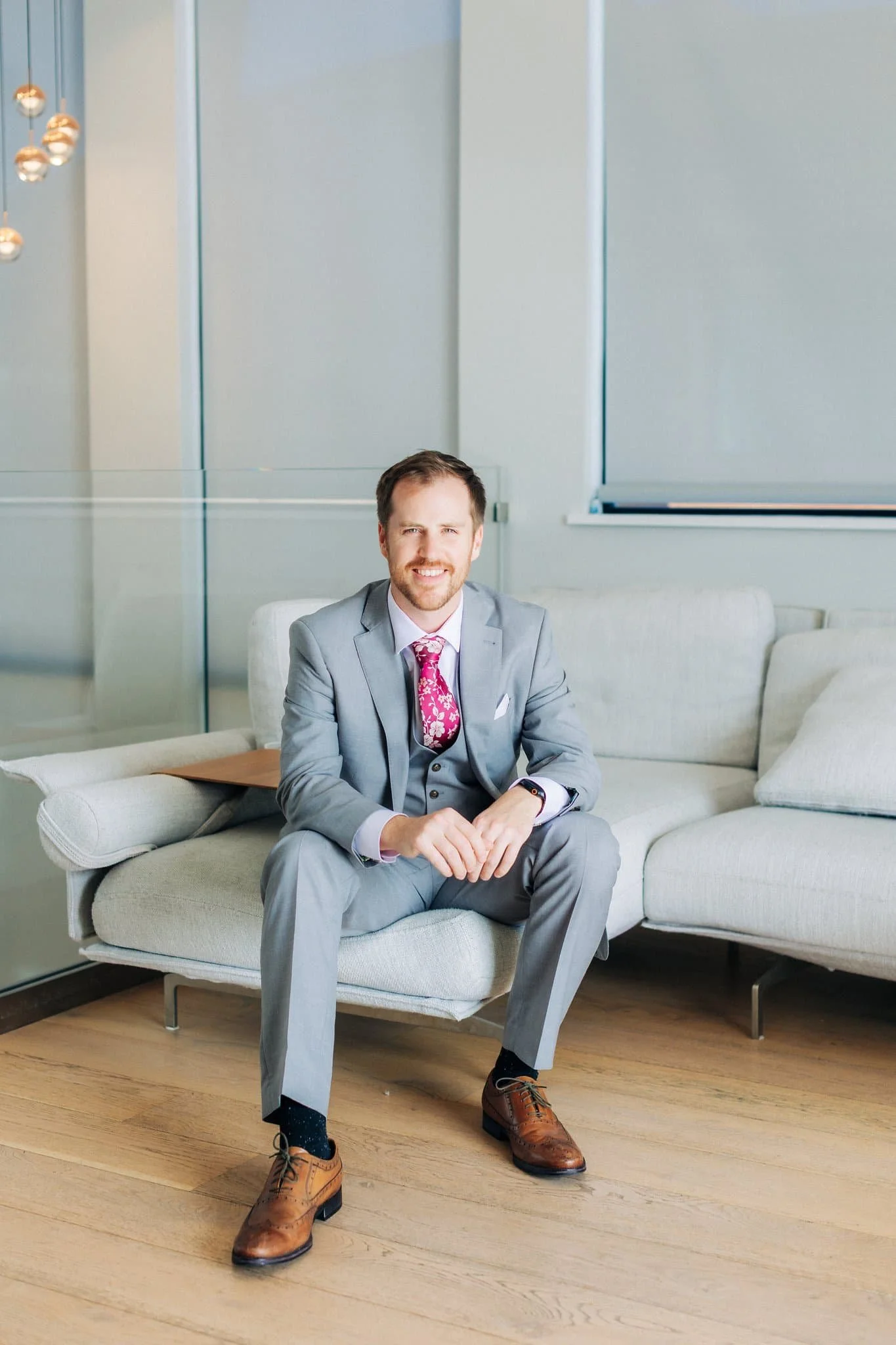 Groom portrait while getting ready at Maverick's Beach House before the Half Moon Bay wedding ceremony