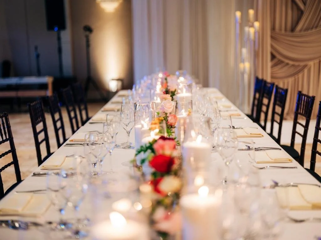 Reception table set for guests at Nishi and Rohan’s wedding