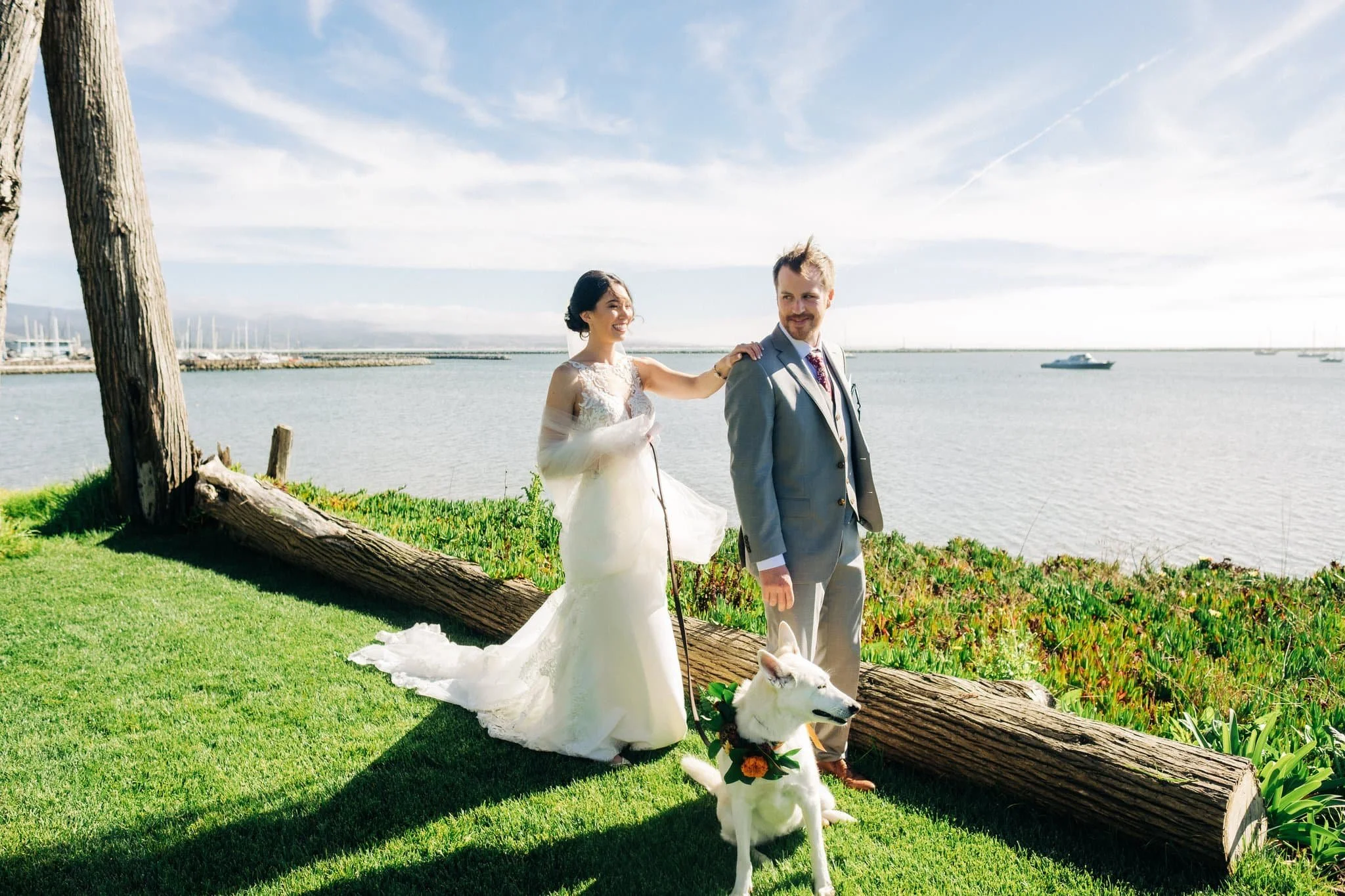 Bride and groom with their dog Layla just after first look at Maverick’s Beach House wedding in Half Moon Bay