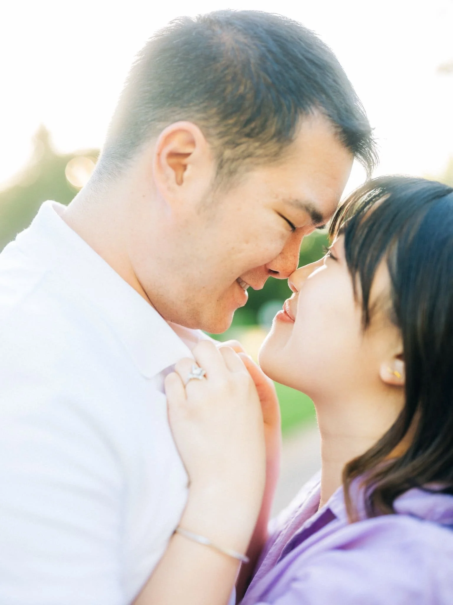 Close-up of the couple face to face and smiling at each other during their Montalvo Arts Center engagement photos in Saratoga.