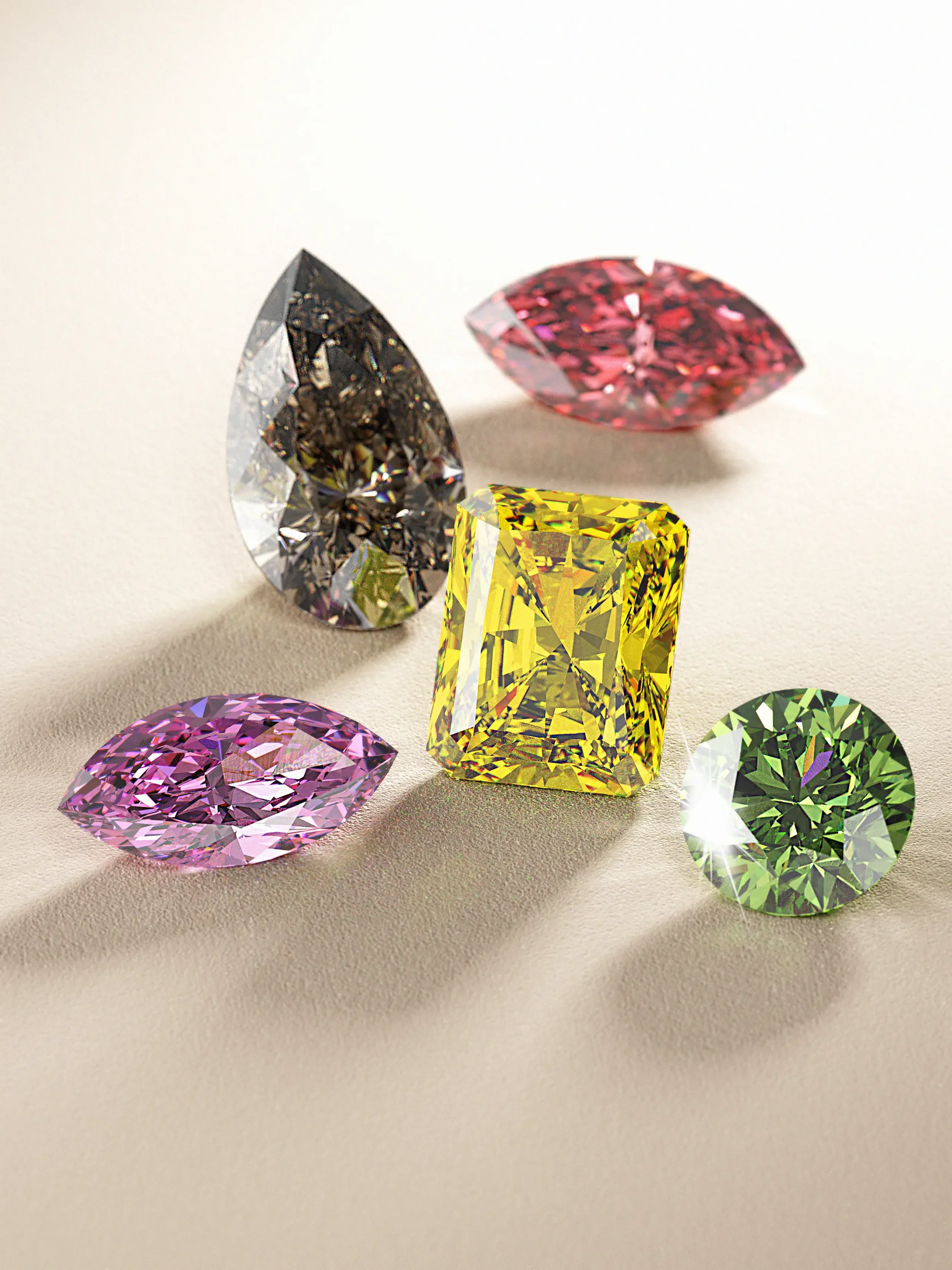 A curated selection of rare loose colored diamonds — radiant yellow, green round, pink marquise, red marquise, and gray pear — photographed on a soft beige background.