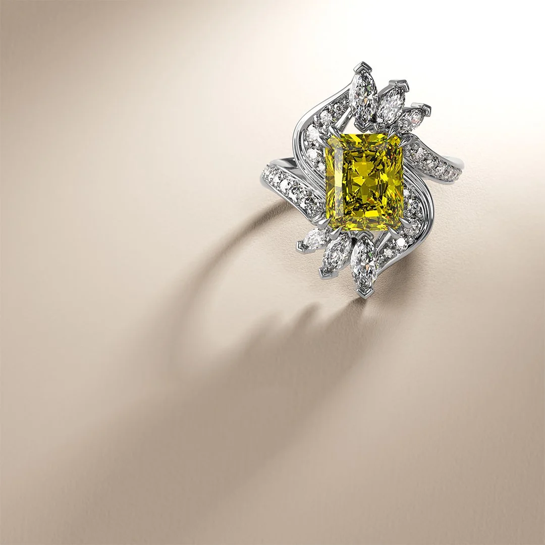 High-end ring with a radiant rare yellow diamond and marquise accent diamonds on a sculpted white-gold design