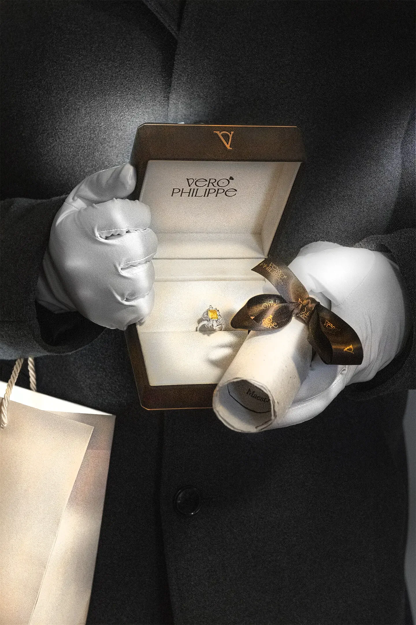 Vero Philippe personal delivery featuring a yellow diamond ring in a handcrafted Alcantara box with certificate