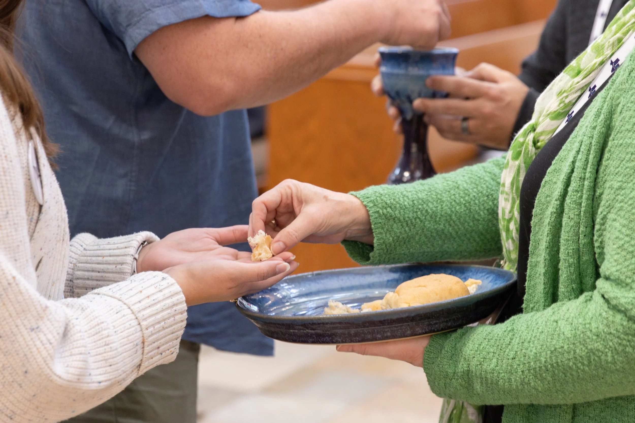 Sat worship (communion hands).jpeg