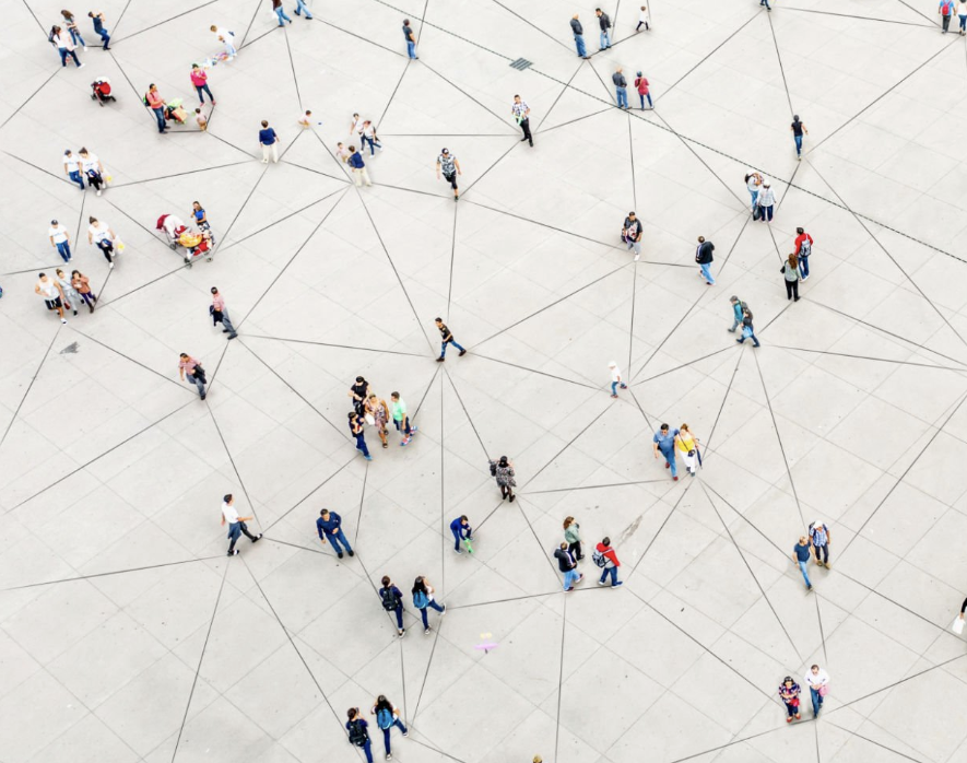 Network of people from Above; wearing colored clothing, connected by lines | Enterprise AI Research brief
