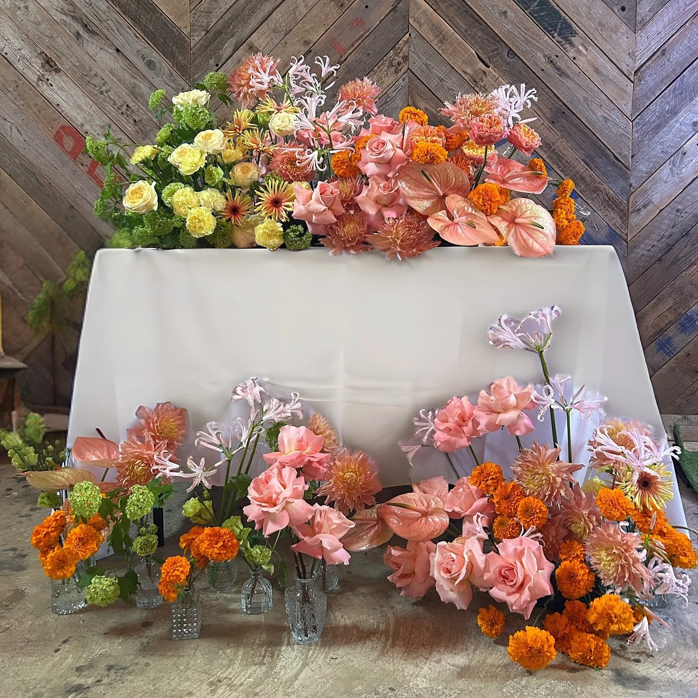 For @quirky.weddings , The most joyful mix of coral, peach, and marigold blooms designed to celebrate love ❤️&zwj;🔥 Thankyou to everyone who came to say hi! 

#buablooms #modernbride #modernwedding #colourfulflowers #modernflorals #essexflorist #lon