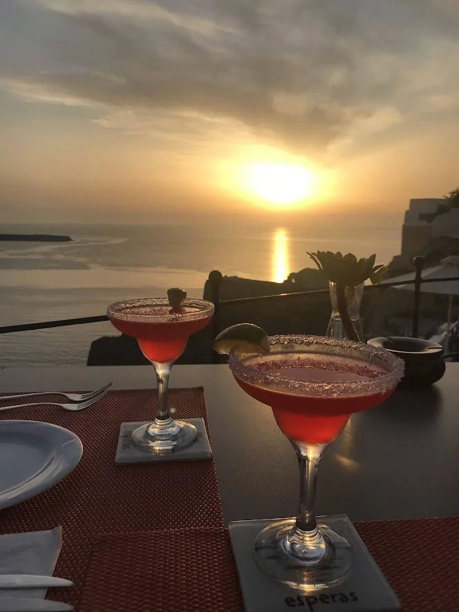 Cocktails at sunset in santorini