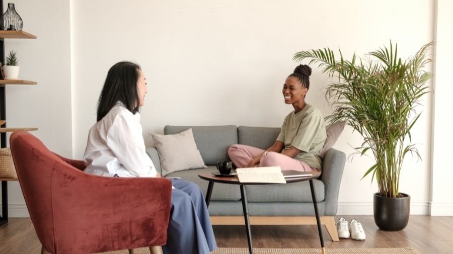 A serene image of hypnotherapy in action, offering support and guidance to individuals looking to move forward in life after a significant transition.