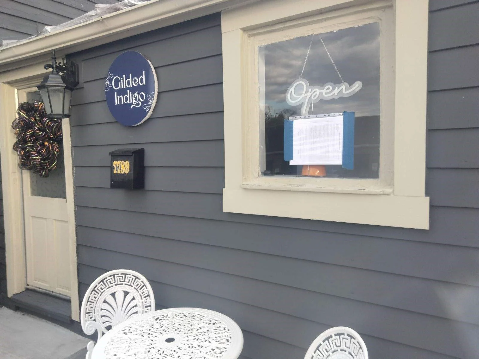 Gilded Indigo Wall Sign Installed 1.jpg