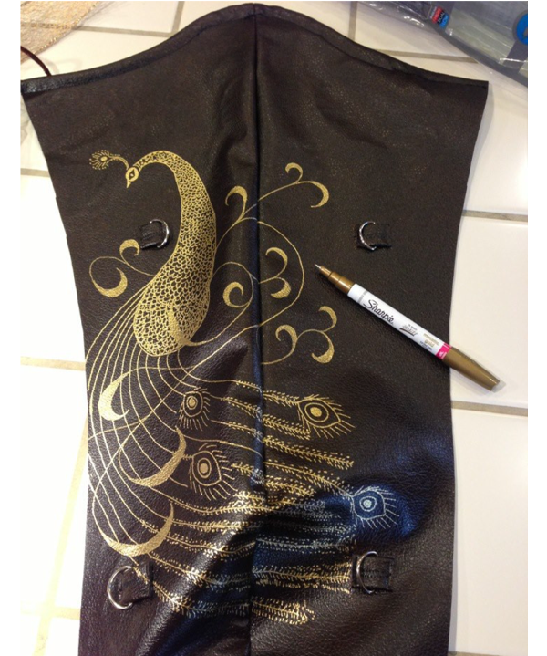 I drew a decorative peacock on the quiver that I made to go with the Legolas costume