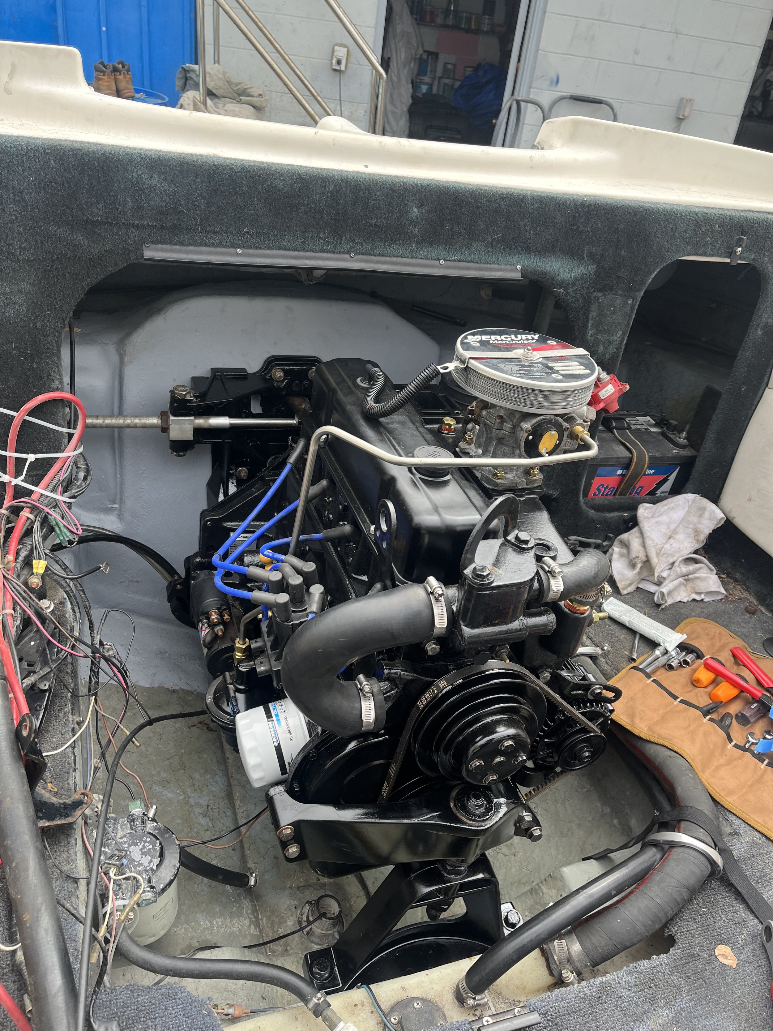 This is the Mercruiser 3.0 long block with the old engines parts that were cleaned, primed, painted, and installed on the new engine.