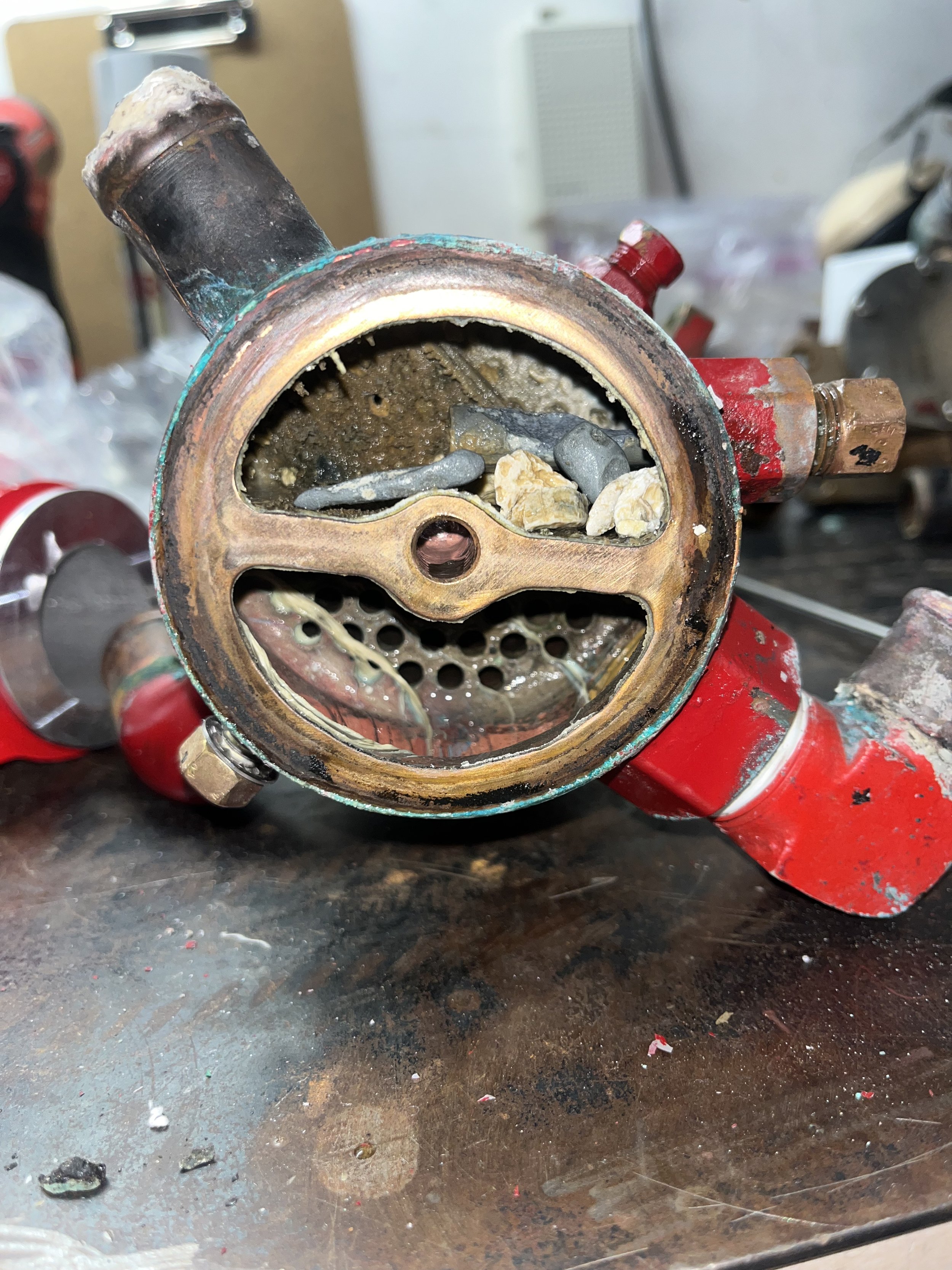 Built up debris inside the Westerbeke 30B3 heat exchanger.